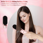 Woman creating a smooth blowout with the pink ionic hot air brush styler